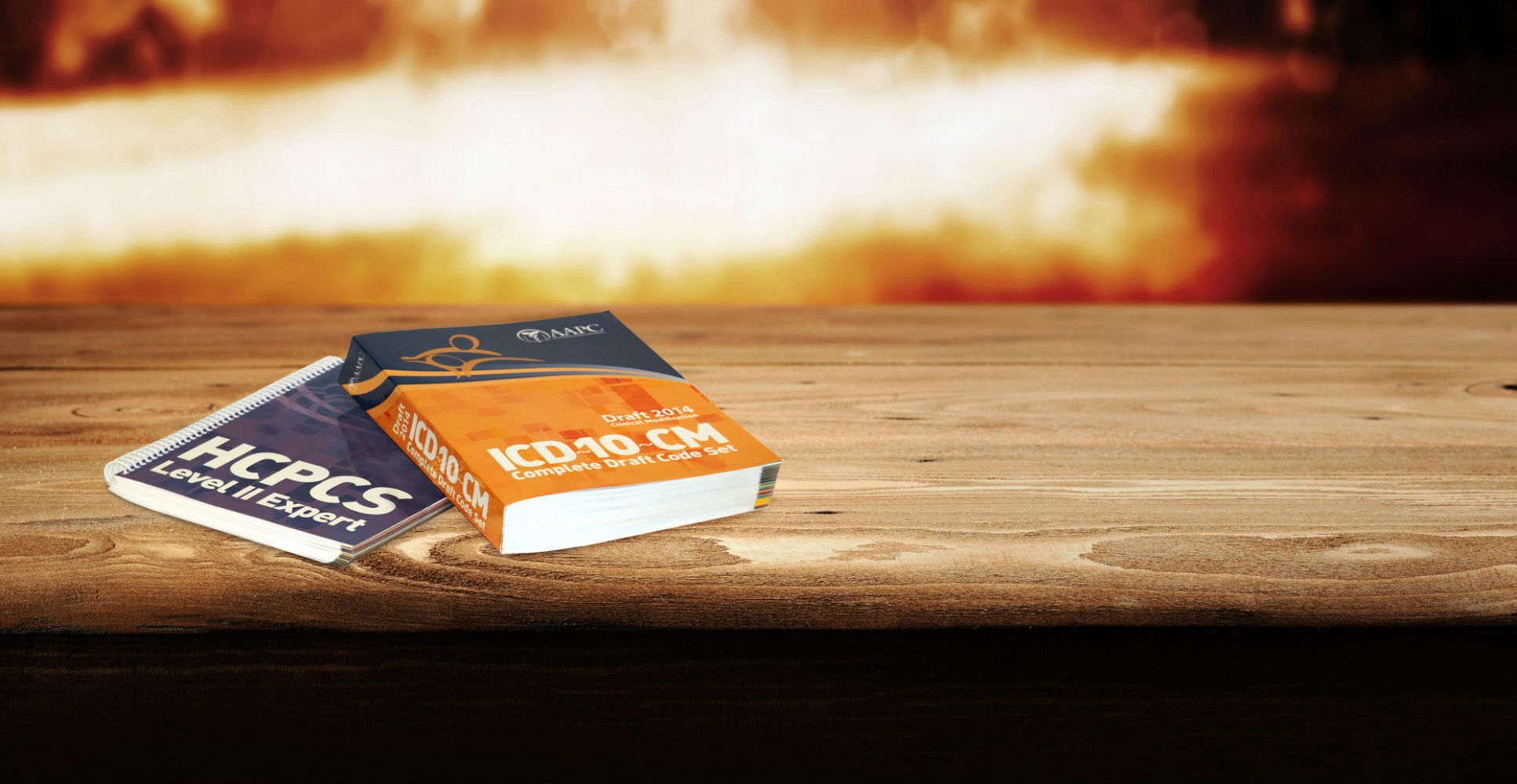 icd10 books on wood table